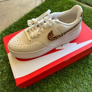 Nike White and Brown Sneakers with Snakeskin Swoosh